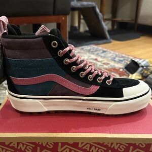 Vans High-Top Sneakers with Pink, Black, and Blue Accents